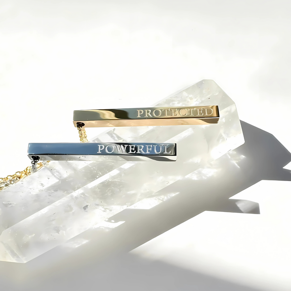 This is a wearable affirmation necklace designed to support emotional protection, strong boundaries, and nervous system regulation through everyday touch.